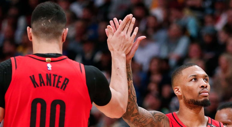 Damian Lillard and Enes Kanter Damian Lillard and Enes Kanter