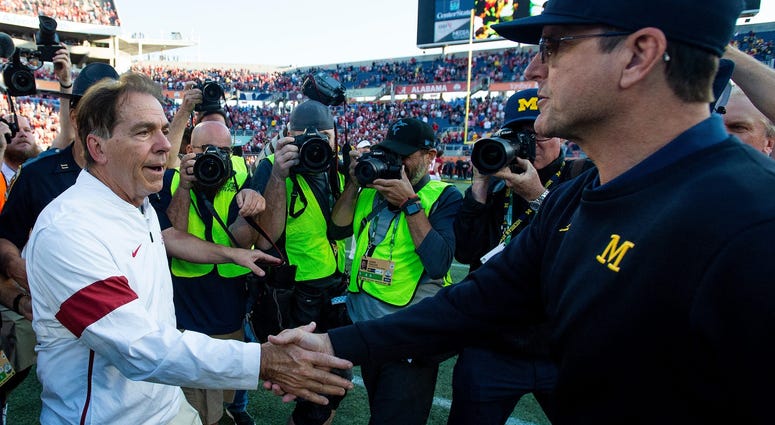 Nick Saban and Jim Harbaugh Nick Saban and Jim Harbaugh