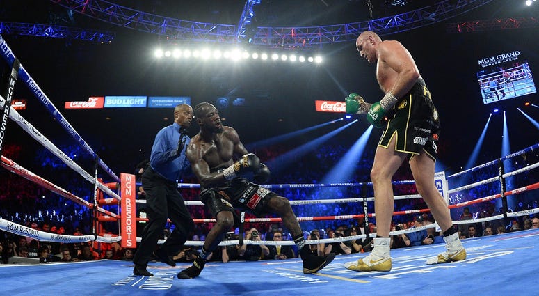 Tyson Fury and Deontay Wilder Tyson Fury and Deontay Wilder