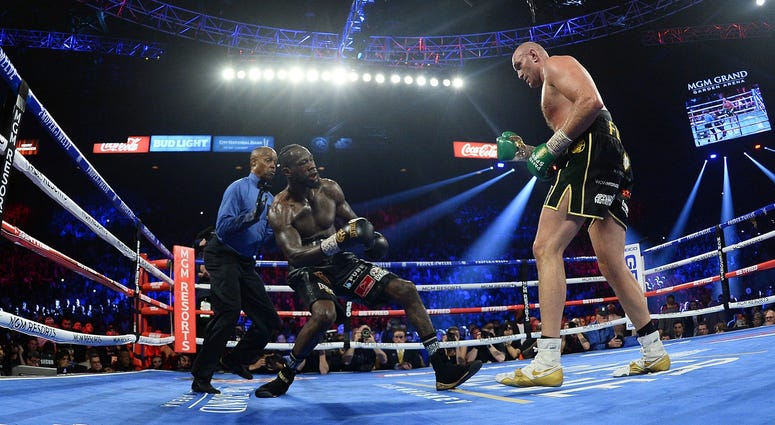 Tyson Fury and Deontay Wilder Tyson Fury and Deontay Wilder