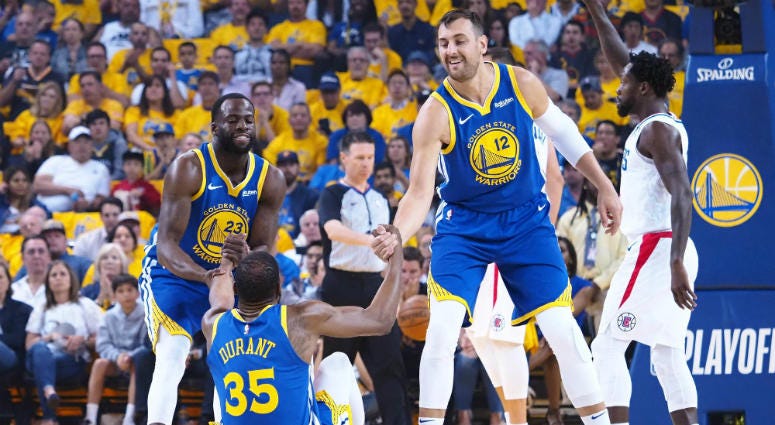 Andrew Bogut with Kevin Durant and Draymond Green Andrew Bogut with Kevin Durant and Draymond Green