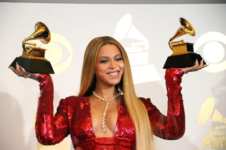 Beyonce Knowles poses during the 59th Annual GRAMMY Awards Beyonce Knowles poses during the 59th Annual GRAMMY Awards