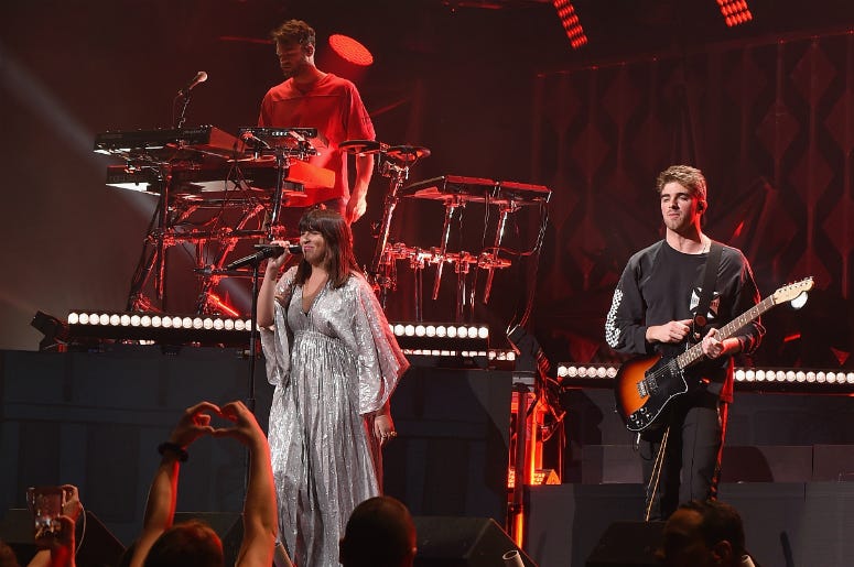 The Chainsmokers & Emily Warren PHILADELPHIA, PA - DECEMBER 06: The Chainsmokers and Emily Warren perform onstage at Wells Fargo Center on December 6, 2017 in Philadelphia Pennsylvania.