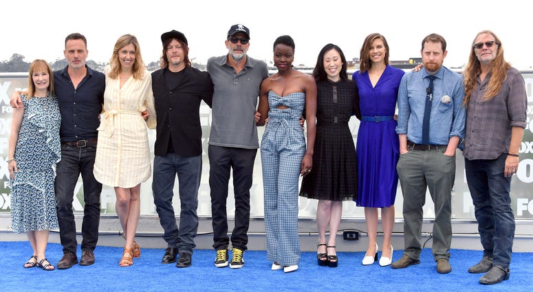 Cast of AMC's "The Walking Dead" at San Diego Comic-Con 2018 SAN DIEGO, CA - JULY 20: (L-R) Gale Ann Hurd, Andrew Lincoln, Denise M. Huth, Norman Reedus, Jeffrey Dean Morgan, Danai Gurira, Angela Kang, Lauren Cohan, Scott M. Gimple and Greg Nicotero attend 'The Walking Dead' Photo Call during Comic-Con Internationa