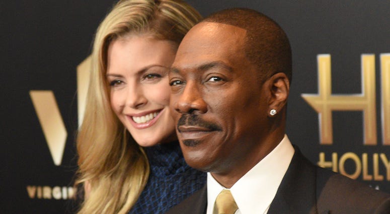 Paige Butcher and Eddie Murphy HOLLYWOOD, CA - NOVEMBER 06: Paige Butcher (L) and Eddie Murphy attend the 2016 Hollywood Film Awards at The Beverly Hilton Hotel on November 6, 2016 in Hollywood, California. (Photo by ISA/imageSPACE)