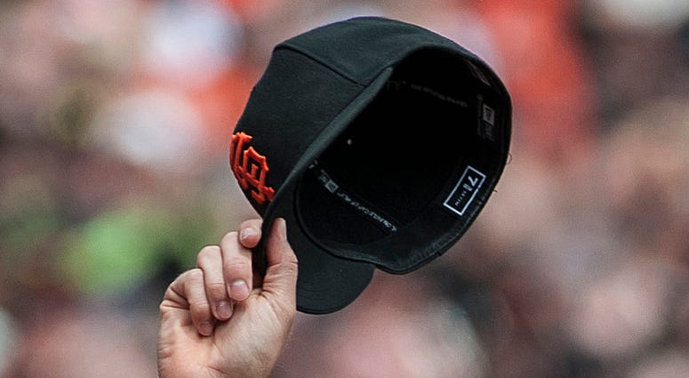 Hats Off - San Francisco Giants Cap Apr 6, 2013; San Francisco, CA, USA; San Francisco Giants catcher Buster Posey (28) tips his cap to the crowd before the game against the St. Louis Cardinals at AT&T Park. Mandatory Credit: Ed Szczepanski-USA TODAY Sports