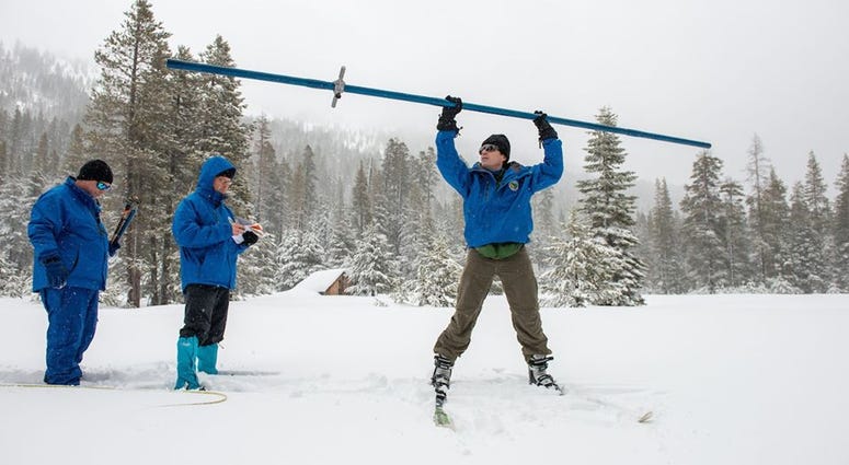 Workers with the state Department of Water Resources recorded a below average measurement of the state's snowpack on Jan. 30, 2020. Workers with the state Department of Water Resources recorded a below average measurement of the state's snowpack on Jan. 30, 2020.