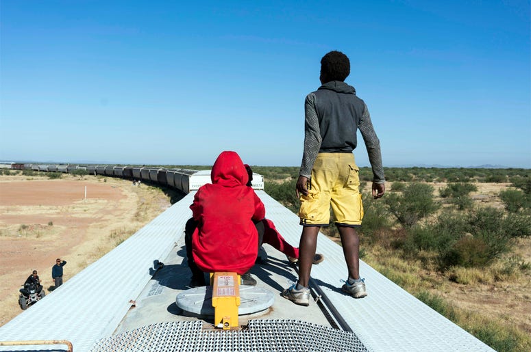 Migrants on La Bestia, or "The Beast" Oct 25, 2016; Sonora, Mexcio; Hondurans and Central Americans take a freight train, known by migrants as La Bestia, the beast, to come to the border town of Mexico to cross US-Mexico border. Mandatory credit: Nick Oza/The Republic via USA TODAY NETWORK