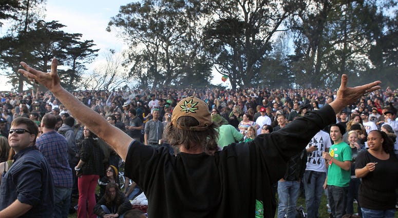 4/20 Celebration at olden Gate Park's Hippie Hill SAN FRANCISCO - APRIL 20: A cloud of smoke rests over the heads of a group of people during a 420 Day celebration on 'Hippie Hill' in Golden Gate Park April 20, 2010 in San Francisco, California. April 20th has become a de facto holiday for marijuana advo