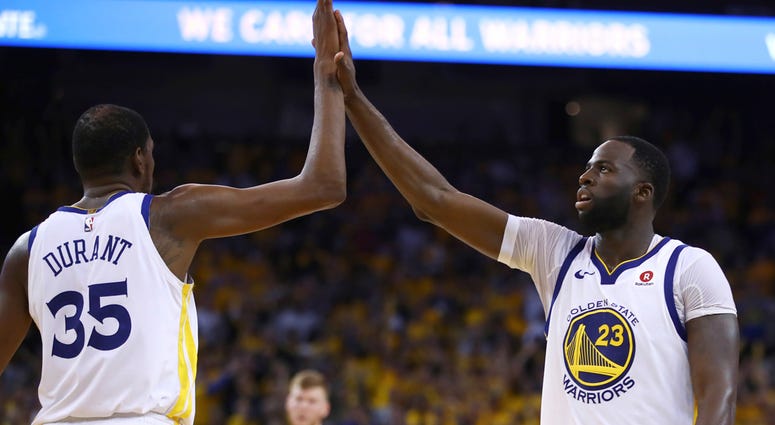Golden State Warriors' Kevin Durant and Draymond Green Golden State Warriors' Kevin Durant and Draymond Green