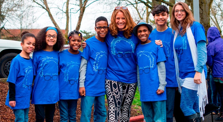 AP18103805230212 FILE - This March 20, 2016, file photo shows Hart family of Woodland, Wash., at a Bernie Sanders rally in Vancouver, Wash. A body was recovered Saturday, April 7, 2018, in the vicinity where an SUV plunged off a Northern California cliff last month, killi