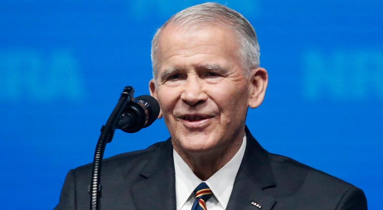AP18127637558722 In this May 4, 2018 photo, former U.S. Marine Lt. Col. Oliver North speaks before giving the Invocation at the National Rifle Association-Institute for Legislative Action Leadership Forum in Dallas. The NRA announced today that North will become President