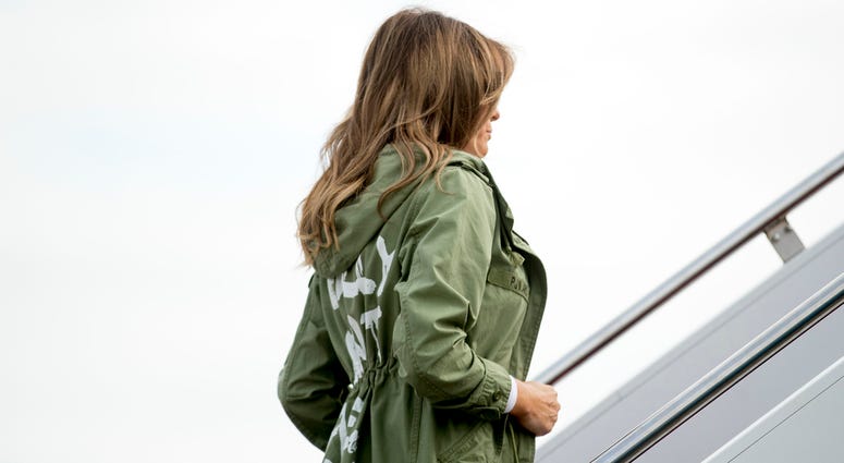 AP18172687381364 First lady Melania Trump boards a plane at Andrews Air Force Base, Md., Thursday, June 21, 2018, to travel to Texas. (AP Photo/Andrew Harnik)