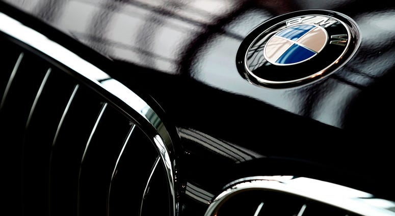 AP18190469253830 In this Wednesday, March 21, 2018 file photo the logo of German car manufacturer BMW is pictured in Munich, Germany. Automaker BMW said Monday July 9, 2018, it will have to raise prices on the U.S.-built SUVs it sells in China due to 40 percent import tax