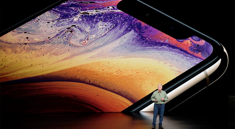 AP18255639192638 Phil Schiller, Apple's senior vice president of worldwide marketing, speaks about the Apple iPhone XS at the Steve Jobs Theater during an event to announce new Apple products Wednesday, Sept. 12, 2018, in Cupertino, Calif. (AP Photo/Marcio Jose Sanchez)