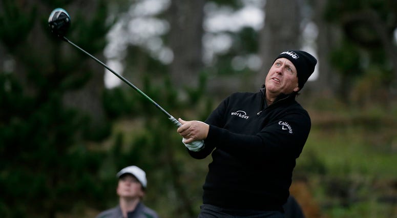 AP19039724879612 Phil Mickelson follows his drive from the 11th tee of the Spyglass Hill Golf Course during the second round of the AT&T Pebble Beach National Pro-Am golf tournament Friday, Feb. 8, 2019, in Pebble Beach, Calif. (AP Photo/Eric Risberg)