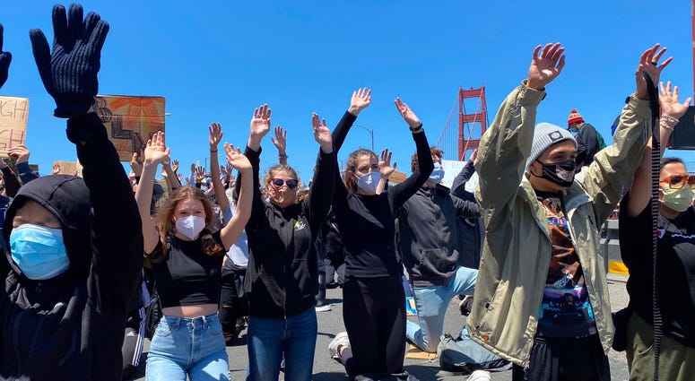 Protesters march across the Golden Gate Bridge in support of the Black Lives Matter movement.