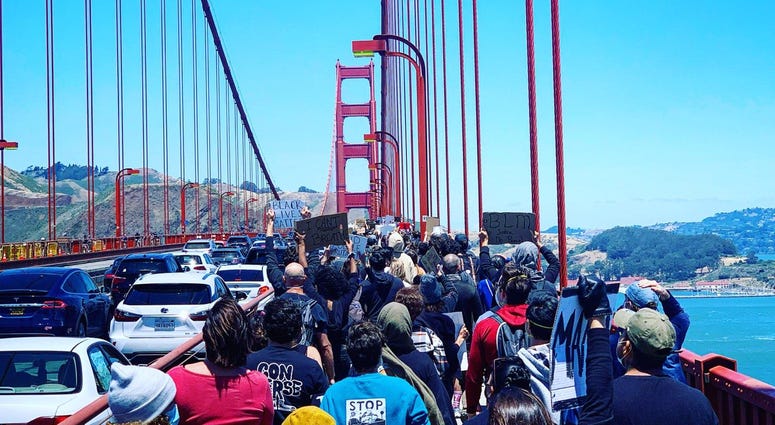 Protesters march across the Golden Gate Bridge in support of the Black Lives Matter movement.