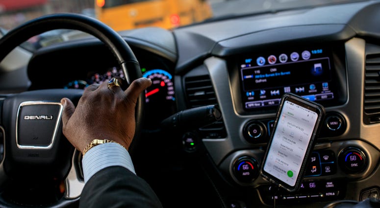 After dropping off passengers at a Broadway play, Johan Nijman, a for-hire driver who runs his own service and also drives for Uber on the side, drives through the West Side of Manhattan on Wednesday evening, August 8, 2018 in New York City. After dropping off passengers at a Broadway play, Johan Nijman, a for-hire driver who runs his own service and also drives for Uber on the side, drives through the West Side of Manhattan on Wednesday evening, August 8, 2018 in New York City.