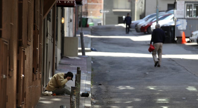 A homeless man sits on the sidewalk on May 17, 2019 in San Francisco. A homeless man sits on the sidewalk on May 17, 2019 in San Francisco.