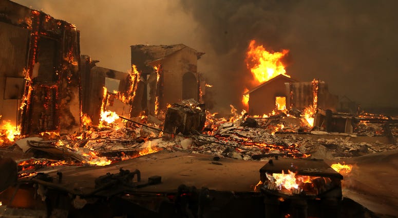 4: A structure continues to burn after the Kincade Fire moved through the area on October 24, 2019 in Geyserville, California. 4: A structure continues to burn after the Kincade Fire moved through the area on October 24, 2019 in Geyserville, California.