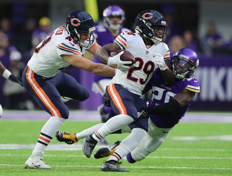 Tarik Cohen #29 of the Chicago Bears gets tackled by Mackensie Alexander #20 of the Minnesota Vikings in the first quarter at U.S. Bank Stadium on December 29, 2019 in Minneapolis, Minnesota. Tarik Cohen #29 of the Chicago Bears gets tackled by Mackensie Alexander #20 of the Minnesota Vikings in the first quarter at U.S. Bank Stadium on December 29, 2019 in Minneapolis, Minnesota.