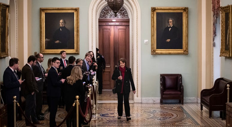 Sen. Dianne Feinstein (D-CA) walks past reporters as she makes her way to the Senate floor for the start of impeachment trial proceedings at the U.S. Capitol on January 21, 2020 in Washington, DC. Sen. Dianne Feinstein (D-CA) walks past reporters as she makes her way to the Senate floor for the start of impeachment trial proceedings at the U.S. Capitol on January 21, 2020 in Washington, DC.