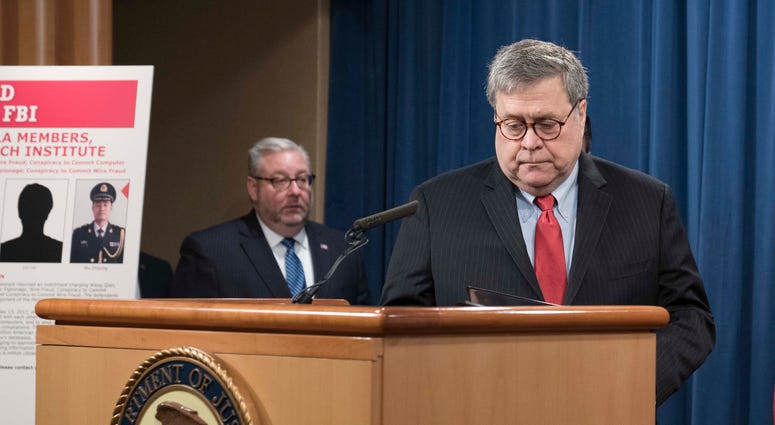 Attorney General William Barr arrives to a press conference at the Department of Justice along with DOJ officials on February 10, 2020 in Washington, DC. Attorney General William Barr arrives to a press conference at the Department of Justice along with DOJ officials on February 10, 2020 in Washington, DC.