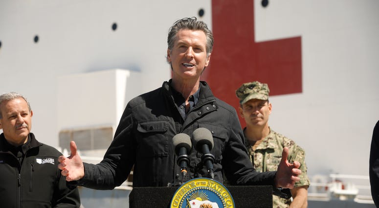 r Gavin Newsom speaks in front of the hospital ship USNS Mercy that arrived into the Port of Los Angeles on Friday, March 27, 2020. r Gavin Newsom speaks in front of the hospital ship USNS Mercy that arrived into the Port of Los Angeles on Friday, March 27, 2020.