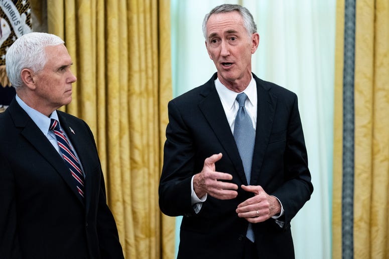 WASHINGTON, DC - MAY 1: U.S. Vice President Mike Pence listens to Gilead Sciences Chairman and CEO Daniel O'Day during an announcement that the Food and Drug Administration issued an emergency approval for the antiviral drug remdesivir in the Oval Office. WASHINGTON, DC - MAY 1: U.S. Vice President Mike Pence listens to Gilead Sciences Chairman and CEO Daniel O'Day during an announcement that the Food and Drug Administration issued an emergency approval for the antiviral drug remdesivir in the Oval Office.