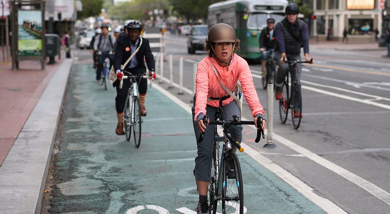 Bicyclists ride along Market Street on May 9, 2013 in San Francisco. Bicyclists ride along Market Street on May 9, 2013 in San Francisco.
