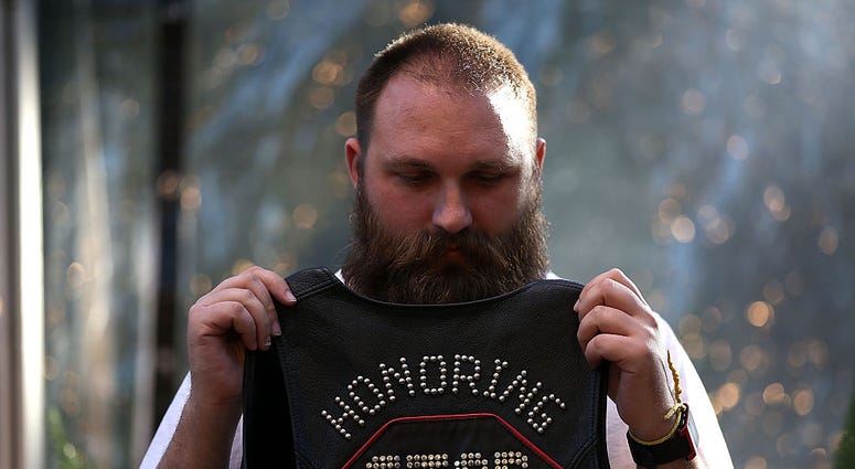 Alexxi Othenin-Girard holds a leather vest during a World AIDS Day commemoration event at the National AIDS Memorial Grove on December 1, 2015 in San Francisco. Alexxi Othenin-Girard holds a leather vest during a World AIDS Day commemoration event at the National AIDS Memorial Grove on December 1, 2015 in San Francisco.