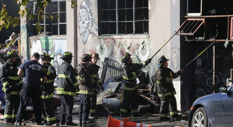 Firefighters work to clear debris at the site of the Ghost Ship warehouse in Oakland where 36 people died in a fire in 2016. Firefighters work to clear debris at the site of the Ghost Ship warehouse in Oakland where 36 people died in a fire in 2016.