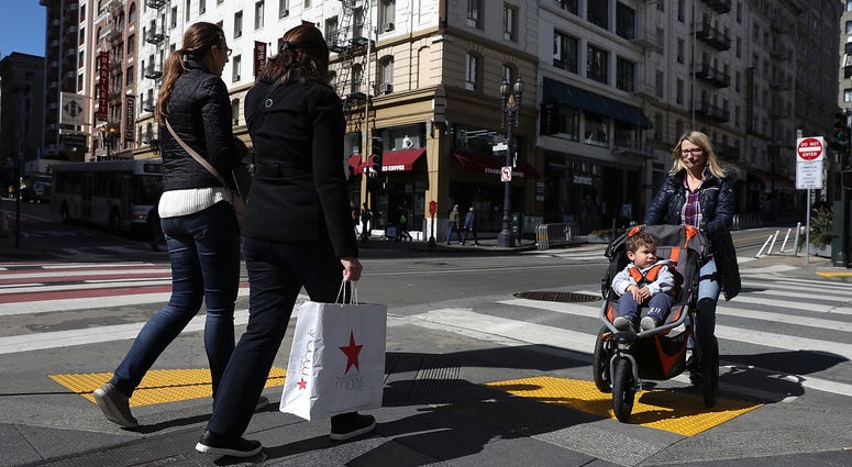 A shopper carries a shopping bag while walking in the Union Square district on February 27, 2018 in San Francisco, California. A shopper carries a shopping bag while walking in the Union Square district on February 27, 2018 in San Francisco, California.