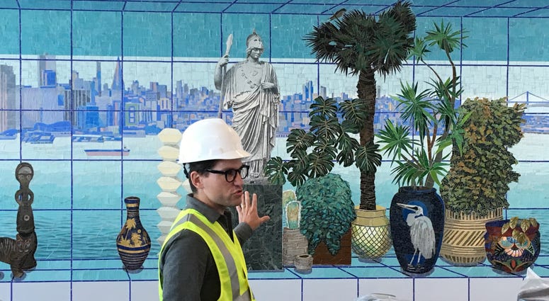 Artist Robert Minervini displays his work during a preview of the new Harvey Milk terminal at San Francisco International Airport. Artist Robert Minervini displays his work during a preview of the new Harvey Milk terminal at San Francisco International Airport.