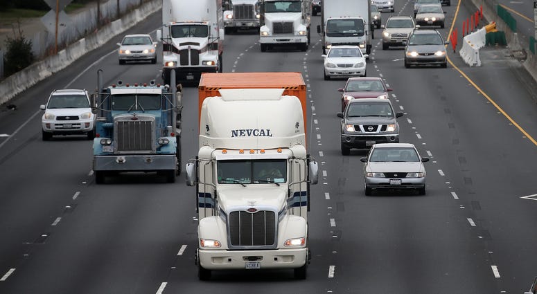 Trucks drive along Interstate 80 on February 18, 2014 in Berkeley, California. Trucks drive along Interstate 80 on February 18, 2014 in Berkeley, California.