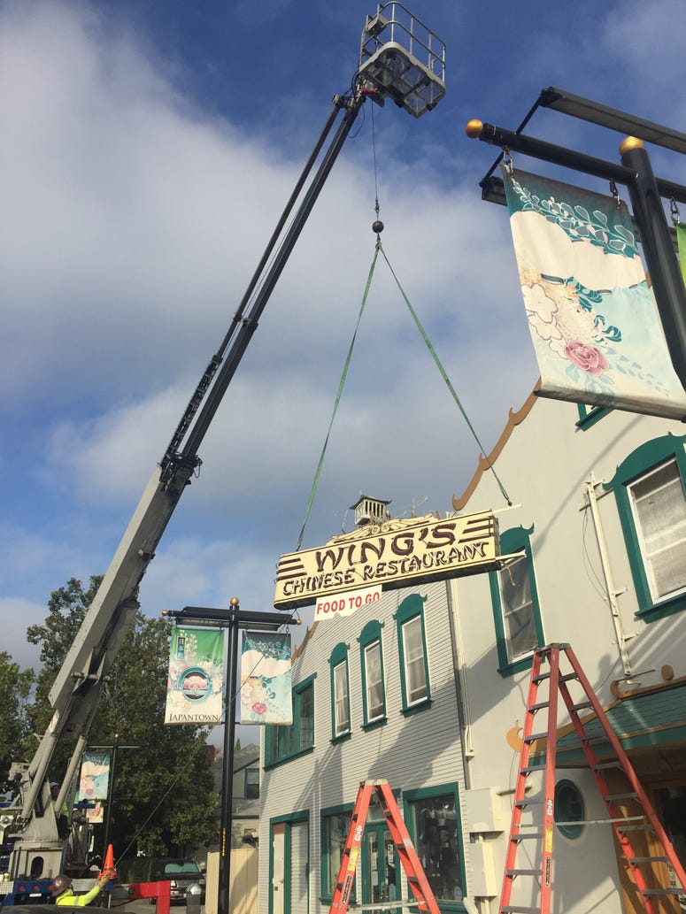 The neon sign that once lighted the way to Wing's Chinese Restaurant was removed on Aug. 28, 2019, months after the restaurant shut. The neon sign that once lighted the way to Wing's Chinese Restaurant was removed on Aug. 28, 2019, months after the restaurant shut.