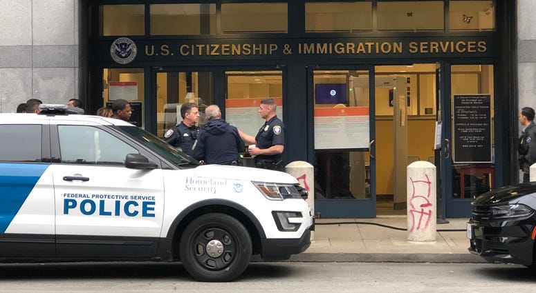 A scene from outside the U.S. Citizenship and Immigration Services office in San Francisco in July 2019. A scene from outside the U.S. Citizenship and Immigration Services office in San Francisco in July 2019.