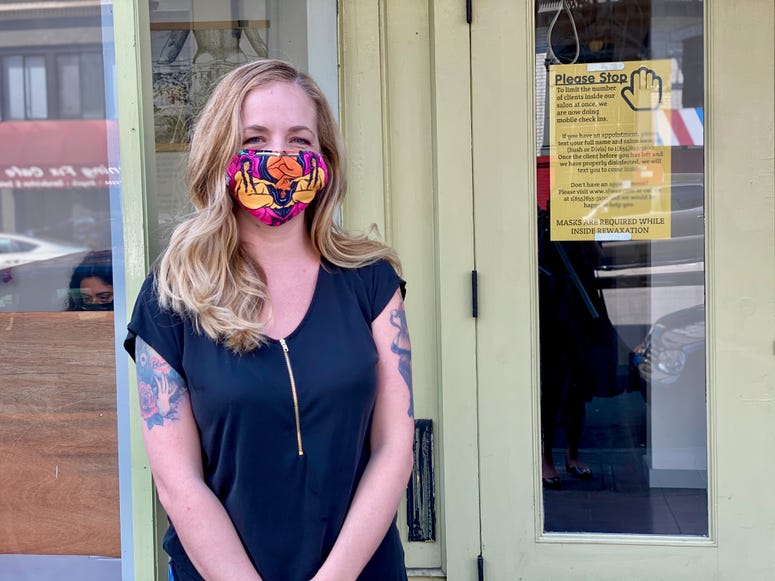 reWAXation Owner Shayana Flick stands in front her business, which opened Monday in defiance of San Francisco's health orders. reWAXation Owner Shayana Flick stands in front her business, which opened Monday in defiance of San Francisco's health orders.