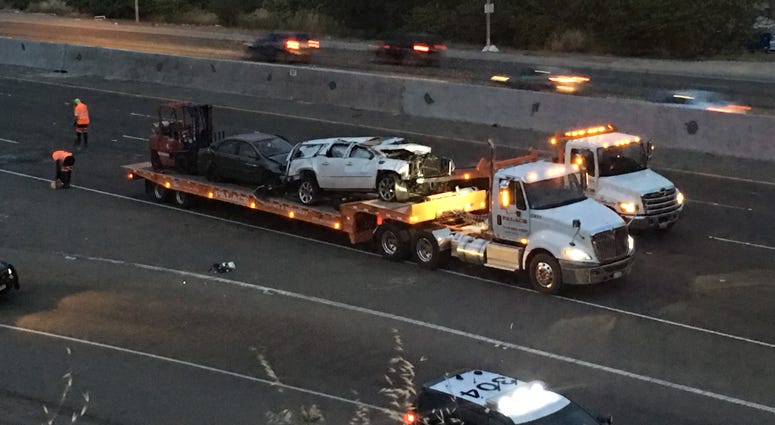 Crashed vehicle and tow truck Crashed vehicle and tow truck