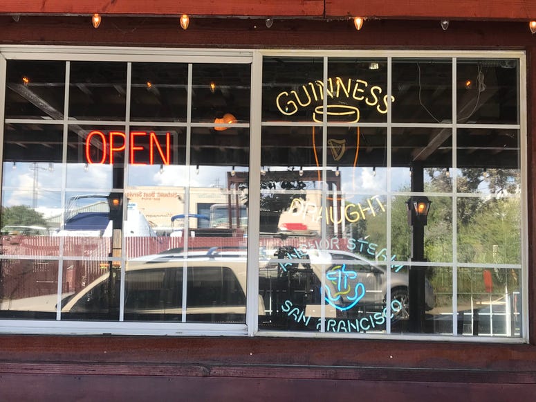 St. James Gate in Belmont continued serving beer and food in its barroom on March 20, 2020 despite the statewide shelter in place order. St. James Gate in Belmont continued serving beer and food in its barroom on March 20, 2020 despite the statewide shelter in place order.