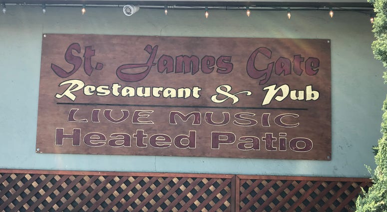 St. James Gate pub in Belmont was seen serving food and drink in its barroom despite a statewide shelter in place order. St. James Gate pub in Belmont was seen serving food and drink in its barroom despite a statewide shelter in place order.