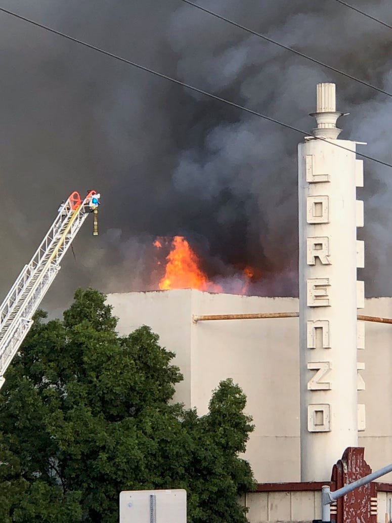 Firefighters battle a fire at the Old San Lorenzo Theater. Firefighters battle a fire at the Old San Lorenzo Theater.