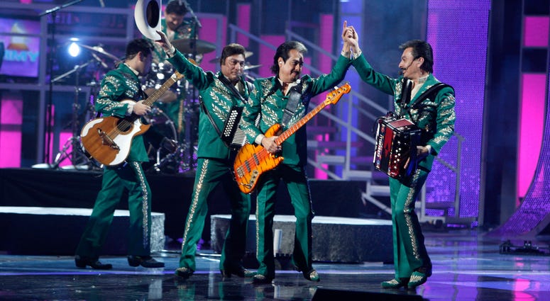 Musical group Los Tigres Del Norte performs during the 9th annual Latin GRAMMY awards in Houston, Texas, 2008. Musical group Los Tigres Del Norte performs during the 9th annual Latin GRAMMY awards in Houston, Texas, 2008.