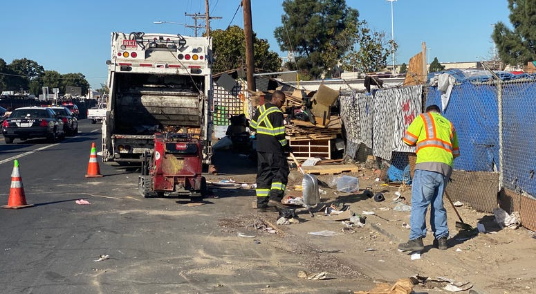 Oakland workers clean up homeless camp near Fruitvale Home Depot Oakland workers clean up homeless camp near Fruitvale Home Depot