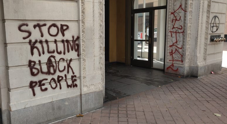 Graffiti seen in downtown Oakland following Friday's protest.