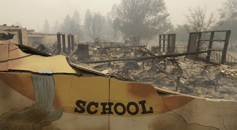 he burned remains of the Paradise Elementary school is seen in a Friday, Nov. 9, 2018 file photo, in Paradise, Calif.