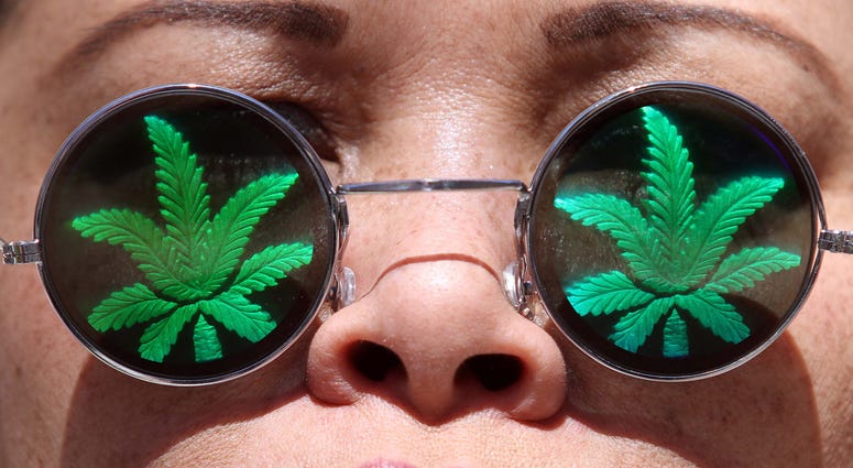 Lisa Marie, of Oakland, California, takes part in a 420 Day rally in front of the Federal Building in downtown Oakland on Friday, April 20, 2012. Lisa Marie, of Oakland, California, takes part in a 420 Day rally in front of the Federal Building in downtown Oakland on Friday, April 20, 2012.