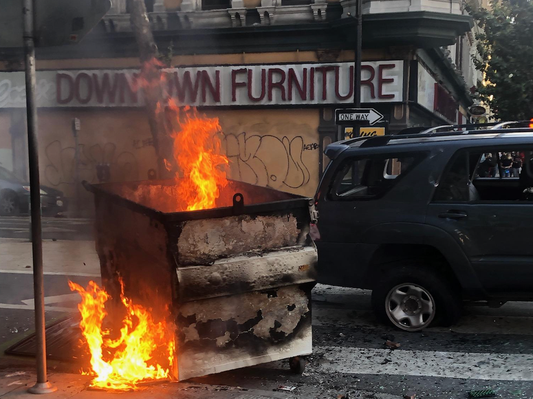 A dumpster on fire in downtown San Jose during a protest over the death of George Floyd. A dumpster on fire in downtown San Jose during a protest over the death of George Floyd.