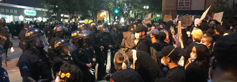 Protesters go toe-to-toe with officers in Oakland. Protesters go toe-to-toe with officers in Oakland.